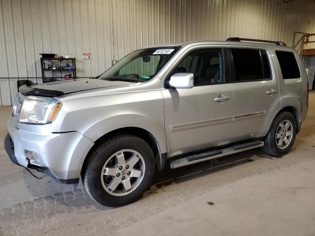 HONDA PILOT TOURING 2011 with VIN 5FNYF4H93BB501187 - Photo from auction