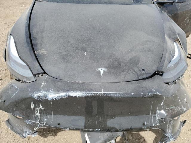 Photo 11 from auction – 2022 TESLA MODEL Y with VIN 7SAYGDEE6NF402126