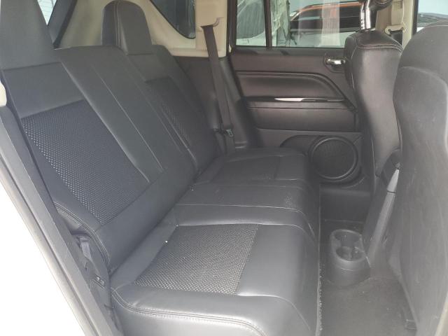 Photo 11 from auction – 2014 JEEP COMPASS LA with VIN 1C4NJDEB3ED696213