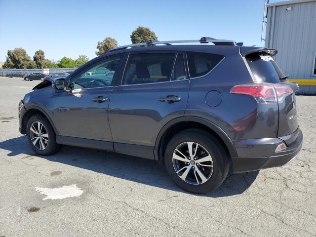 Photo 2 from auction – 2017 TOYOTA RAV4 XLE with VIN JTMWFREV7HJ710665