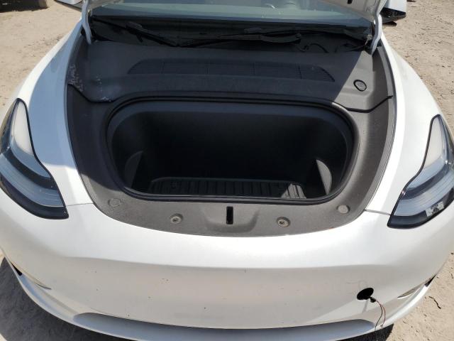 Photo 11 from auction – 2023 TESLA MODEL Y with VIN 7SAYGDEE0PA138160