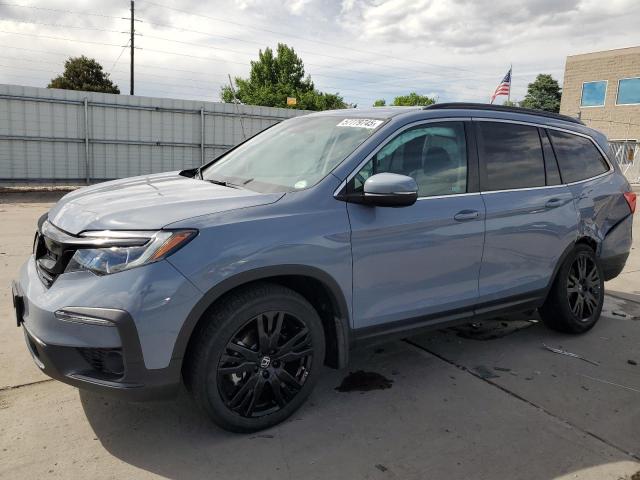 HONDA PILOT SE 2022 with VIN 5FNYF6H2XNB055610 - Photo from auction
