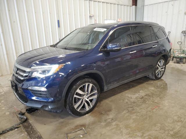 HONDA PILOT ELIT 2018 with VIN 5FNYF6H07JB000184 - Photo from auction