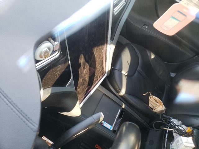 Photo 9 from auction – 2014 TESLA MODEL S with VIN 5YJSA1H13EFP55810