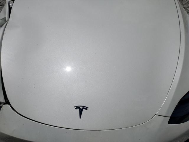 Photo 11 from auction – 2022 TESLA MODEL Y with VIN 7SAYGDEF9NF515612