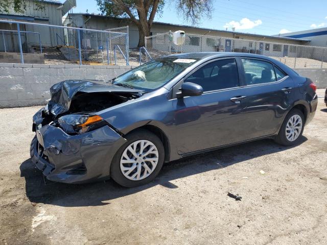 TOYOTA COROLLA L 2019 with VIN 5YFBURHE6KP876372 - Photo from auction