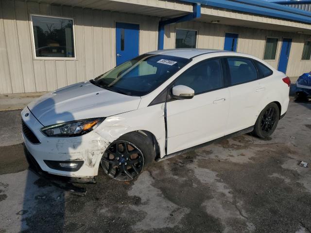 FORD FOCUS SE 2016 with VIN 1FADP3F24GL235393 - Photo from auction