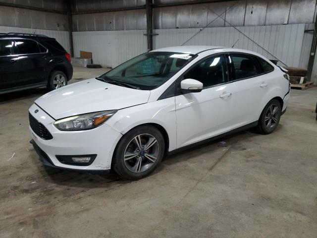 FORD FOCUS SE 2016 with VIN 1FADP3FE8GL324863 - Photo from auction