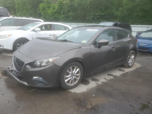MAZDA 323 DX 2014 with VIN JM1BM1M77E1102066 - Photo from auction