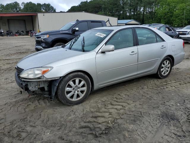 TOYOTA CAMRY LE 2002 with VIN 4T1BF30K82U012074 - Photo from auction