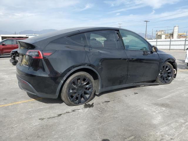 Photo 3 from auction – 2023 TESLA MODEL Y with VIN 7SAYGAEE2PF825495