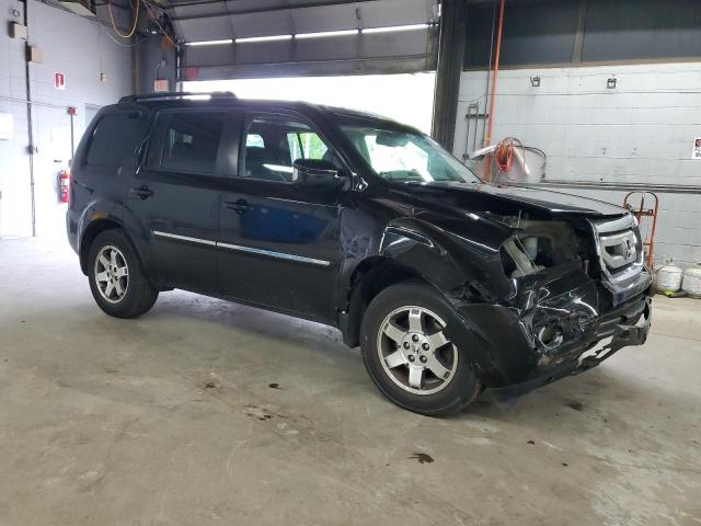 Photo 4 from auction – 2011 HONDA PILOT TOUR with VIN 5FNYF4H99BB084321