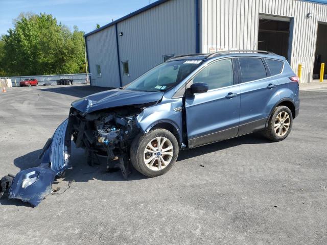 FORD ESCAPE SE 2018 with VIN 1FMCU9GD3JUA87963 - Photo from auction