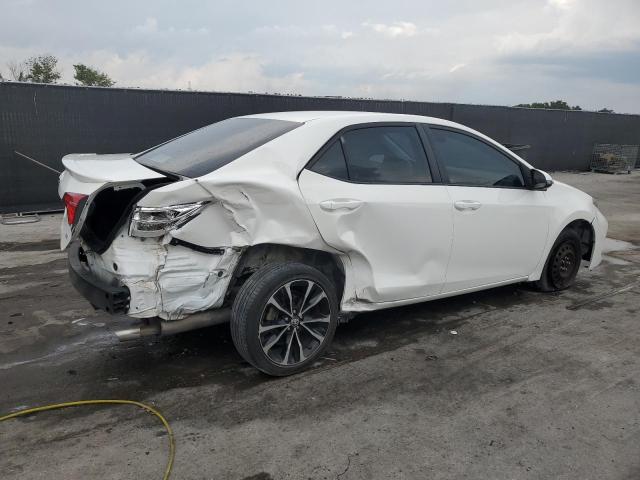 Photo 3 from auction – 2017 TOYOTA COROLLA L with VIN 5YFBURHE4HP714894