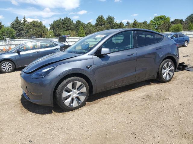TESLA MODEL Y 2023 with VIN 7SAYGDEE8PF869440 - Photo from auction