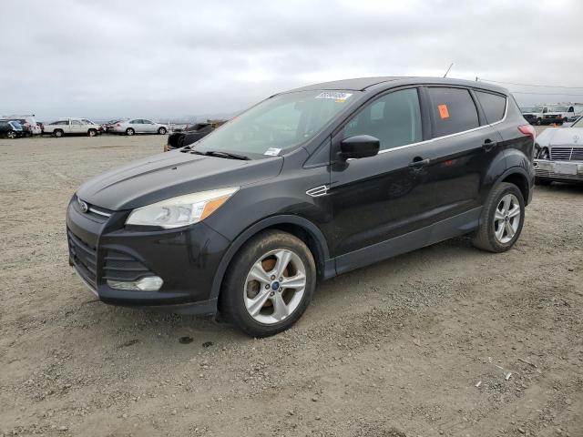 FORD ESCAPE 2014 with VIN 1FMCU0GX1EUC92984 - Photo from auction