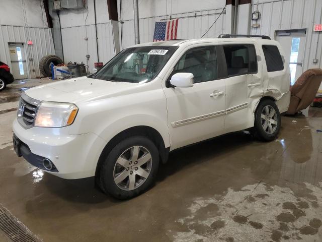 HONDA PILOT TOUR 2014 with VIN 5FNYF4H91EB013280 - Photo from auction
