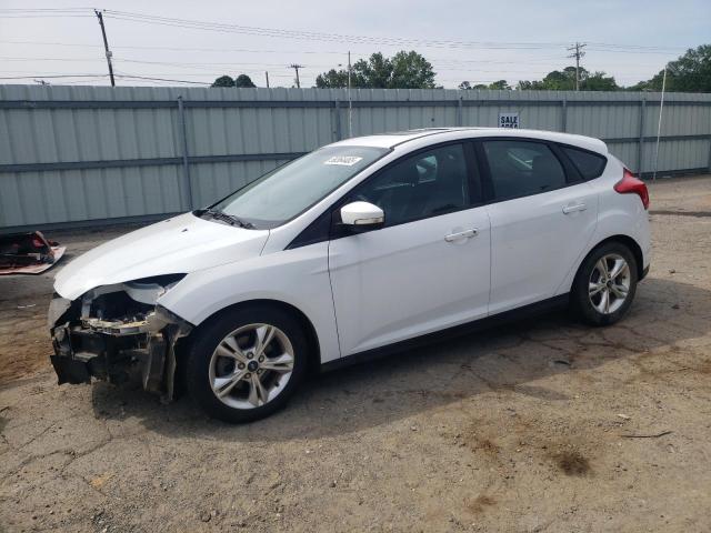 FORD FOCUS SE 2014 with VIN 1FADP3K29EL163125 - Photo from auction