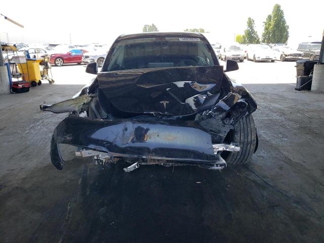 Photo 5 from auction – 2023 TESLA MODEL Y with VIN 7SAYGDEE7PF900919