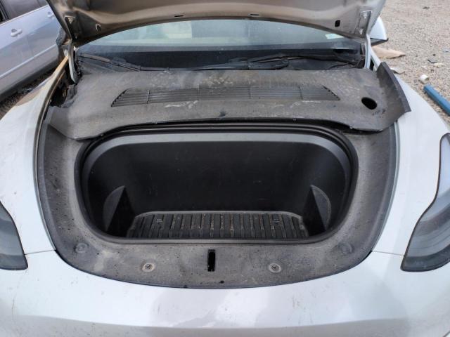 Photo 11 from auction – 2023 TESLA MODEL Y with VIN 7SAYGAEE1PF978353