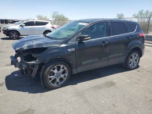 FORD ESCAPE 2013 with VIN 1FMCU0HX9DUB86215 - Photo from auction