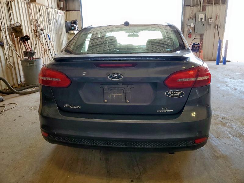 Photo 6 from auction – 2015 FORD FOCUS SE with VIN 1FADP3F20FL321881