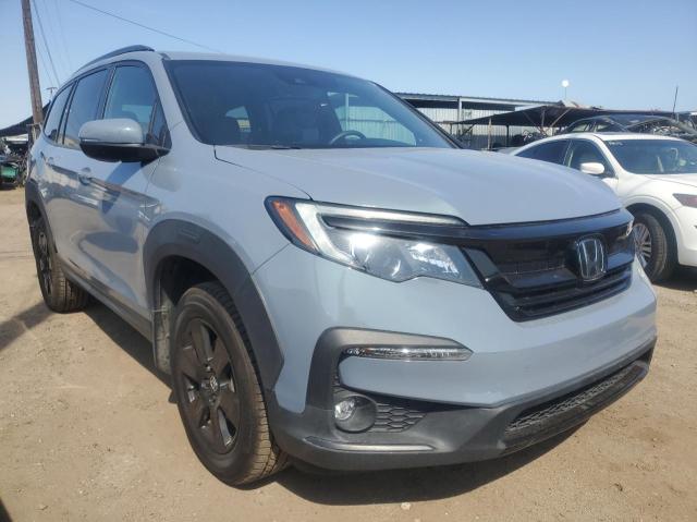 HONDA PILOT TRAI 2022 with VIN 5FNYF6H87NB084261 - Photo from auction