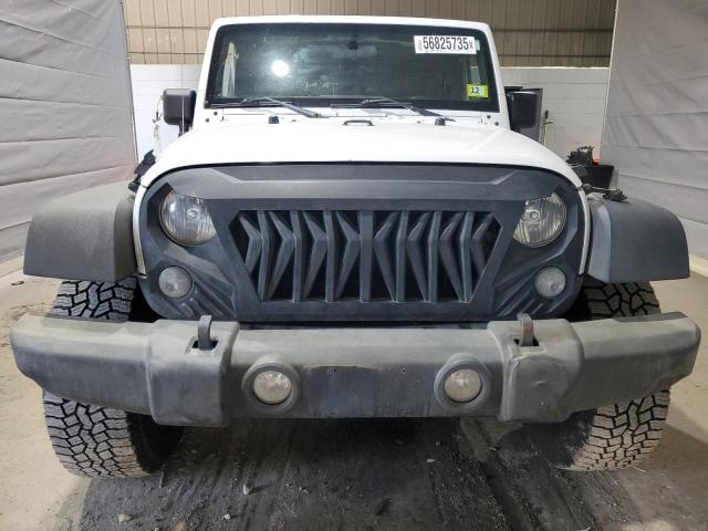 Photo 5 from auction – 2016 JEEP WRANGLER U with VIN 1C4BJWDG0GL337177