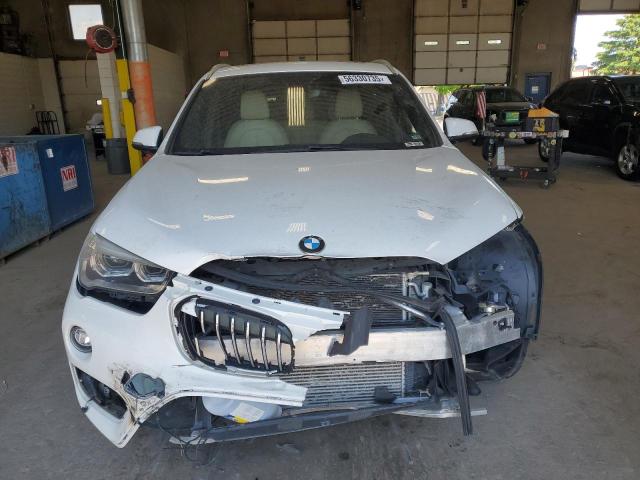 Photo 5 from auction – 2017 BMW X1 XDRIVE2 with VIN WBXHT3C36H5F75824