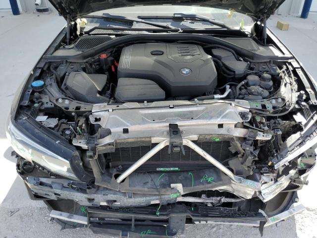 Photo 11 from auction – 2022 BMW 330XI with VIN 3MW5R7J03N8C29897