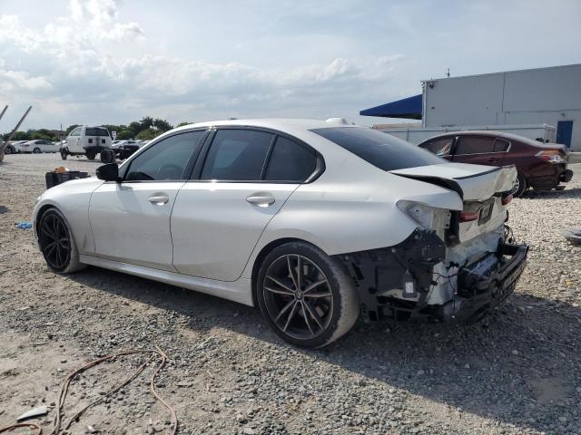 Photo 2 from auction – 2023 BMW 330I with VIN 3MW69FF03P8C91360
