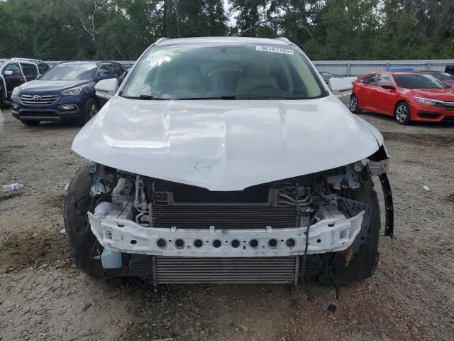 Photo 5 from auction – 2015 LINCOLN MKC with VIN 5LMTJ2AH2FUJ33590
