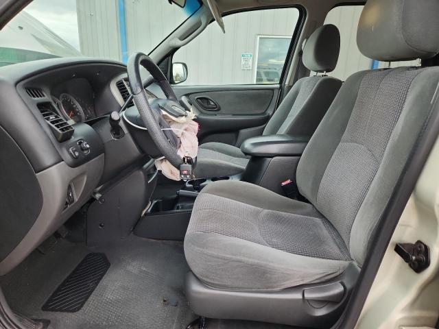 Photo 7 from auction – 2004 MAZDA TRIBUTE LX with VIN 4F2YZ04164KM12932