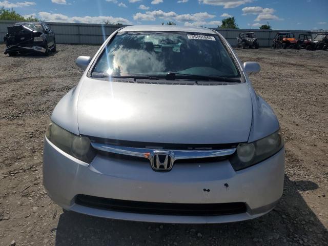 Photo 5 from auction – 2011 HONDA CIVIC LX with VIN 19XFA1F5XBE044095