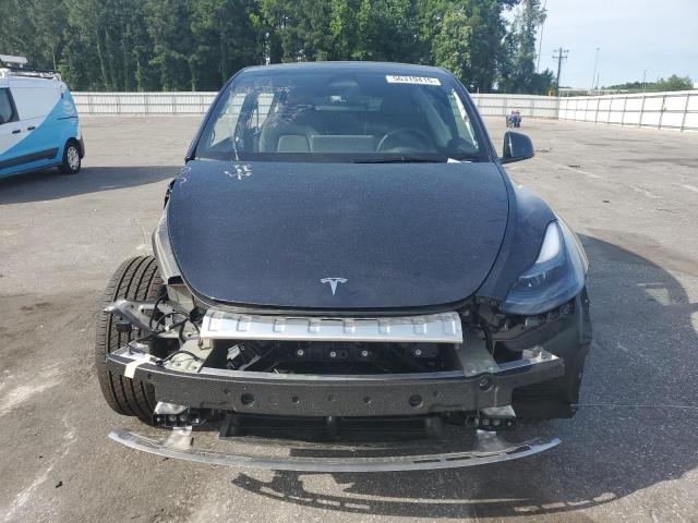 Photo 5 from auction – 2025 TESLA Y with VIN 7SAYGAEE8SF304175