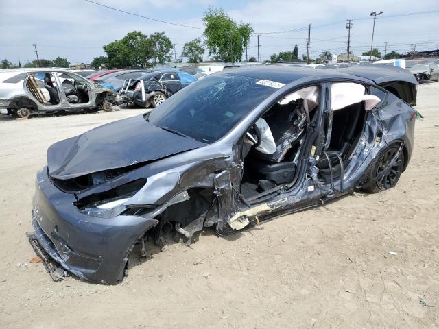 TESLA MODEL Y 2023 with VIN 7SAYGAEE2PF829076 - Photo from auction