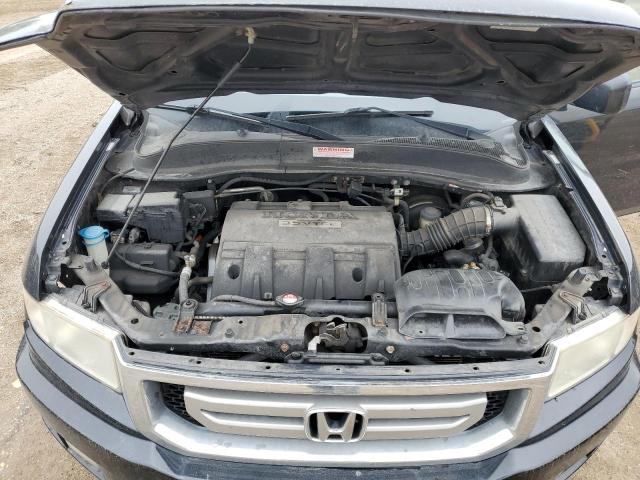 Photo 11 from auction – 2010 HONDA RIDGELINE with VIN 5FPYK1F59AB001440