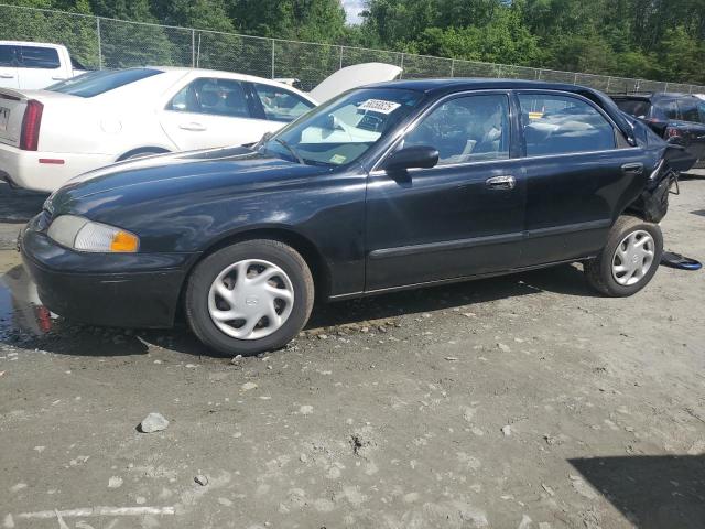 MAZDA 626 ES 1999 with VIN 1YVGF22C8X5883899 - Photo from auction