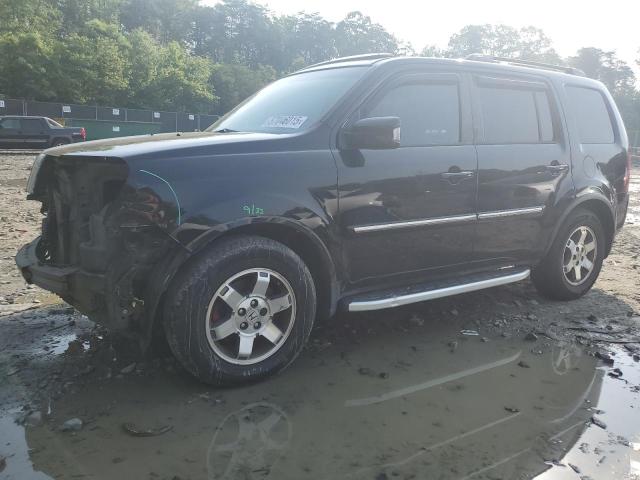 HONDA PILOT TOUR 2011 with VIN 5FNYF4H92BB090512 - Photo from auction