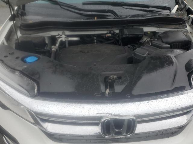 Photo 12 from auction – 2021 HONDA PILOT ELIT with VIN 5FNYF6H06MB023850