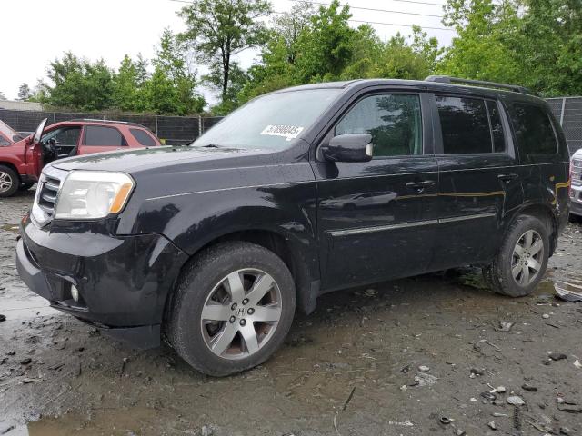 HONDA PILOT TOUR 2014 with VIN 5FNYF4H91EB012999 - Photo from auction