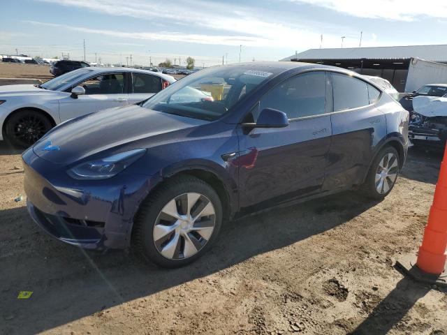 TESLA MODEL Y 2023 with VIN 7SAYGAEE9PF873950 - Photo from auction