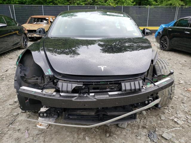 Photo 5 from auction – 2021 TESLA MODEL 3 with VIN 5YJ3E1EA8MF991378