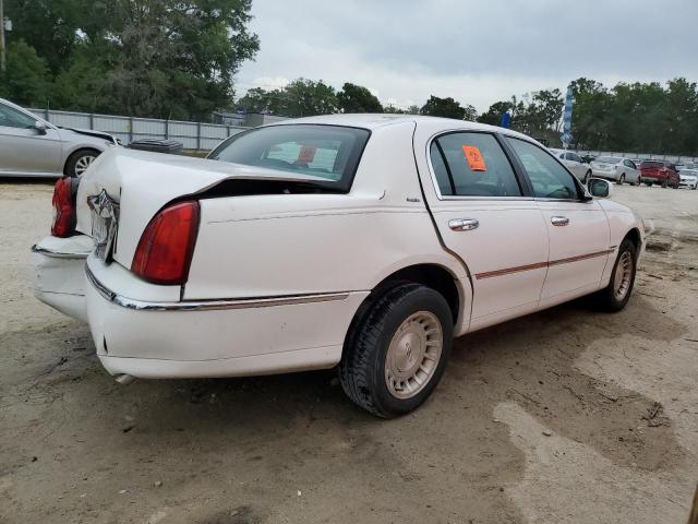 Photo 3 from auction – 2002 LINCOLN TOWN CAR E with VIN 1LNHM81W62Y650606