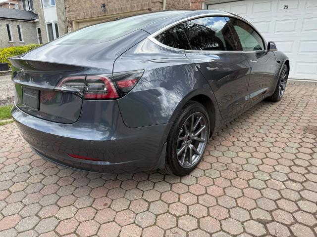 Photo 4 from auction – 2020 TESLA MODEL 3 with VIN 5YJ3E1EA6LF721063