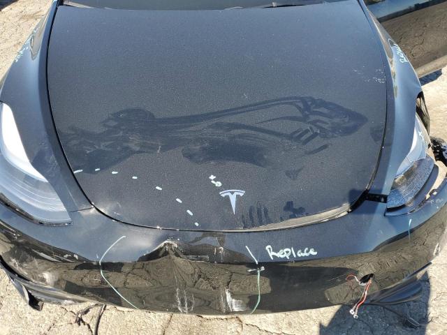 Photo 11 from auction – 2025 TESLA MODEL Y with VIN 7SAYGAEE5SF312735