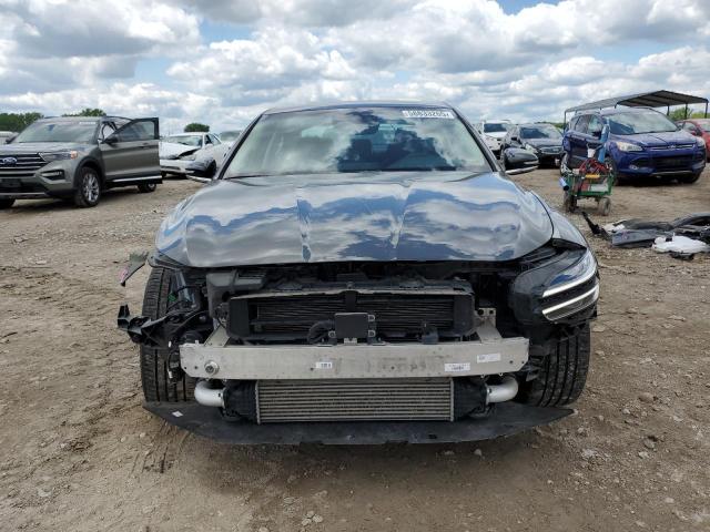 Photo 5 from auction – 2023 GENESIS G70 BASE with VIN KMTG34TA0PU129300
