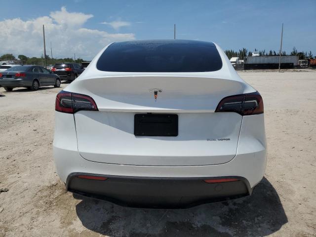Photo 6 from auction – 2023 TESLA MODEL Y with VIN 7SAYGDEE0PA138160
