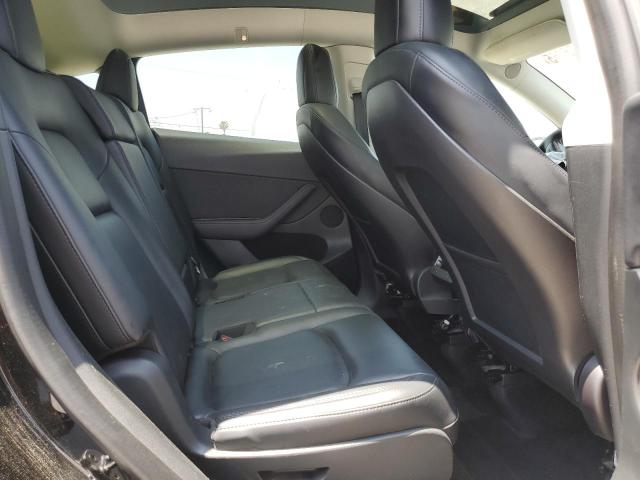 Photo 11 from auction – 2023 TESLA MODEL Y with VIN 7SAYGAEE1PF624655