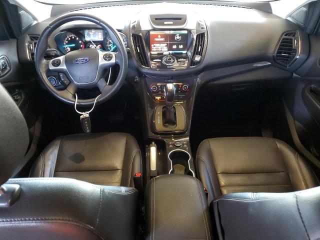 Photo 8 from auction – 2015 FORD ESCAPE TITANIUM with VIN 1FMCU0JX1FUC63527